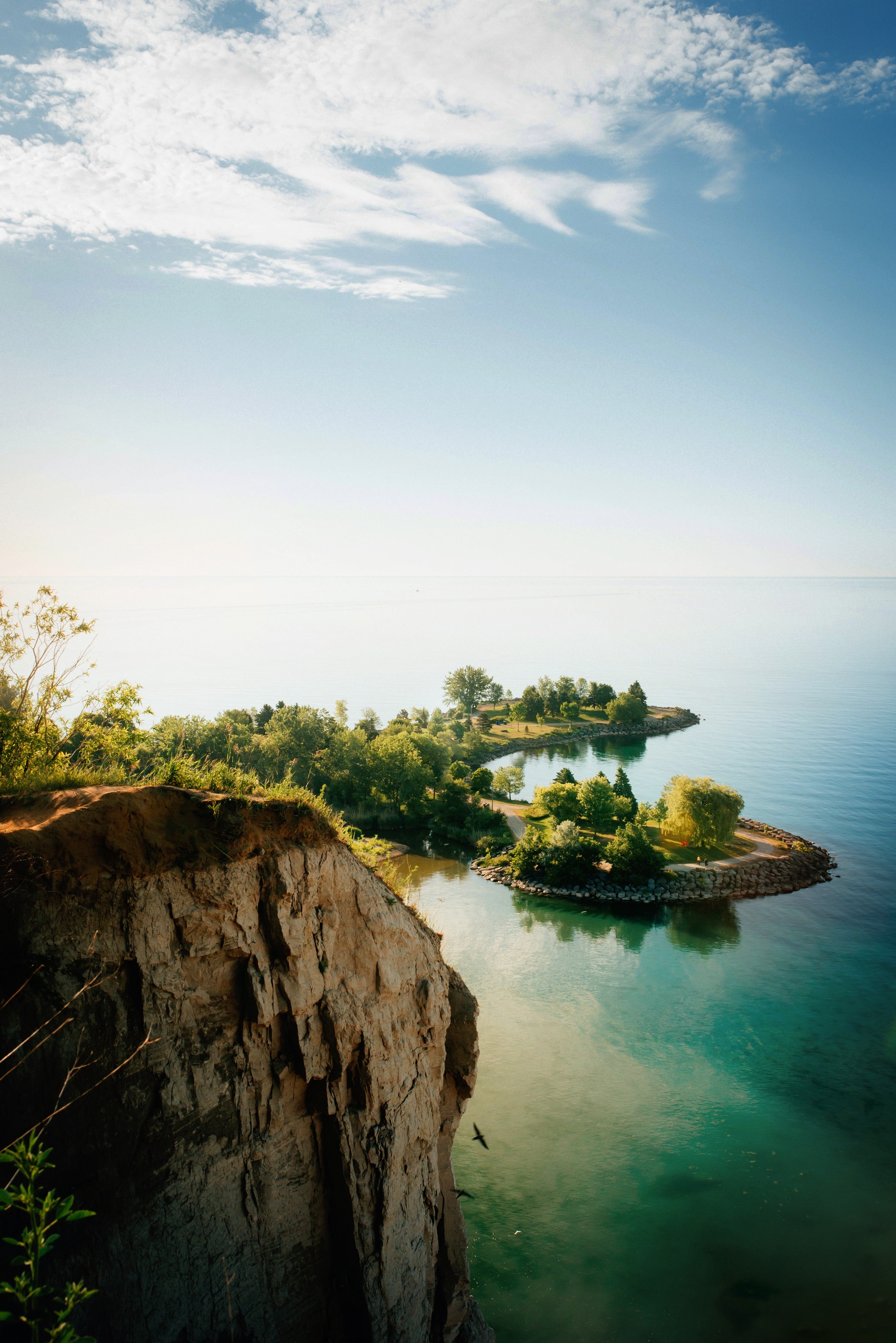 files/lakeside-cliffs-and-blue-sky.jpg